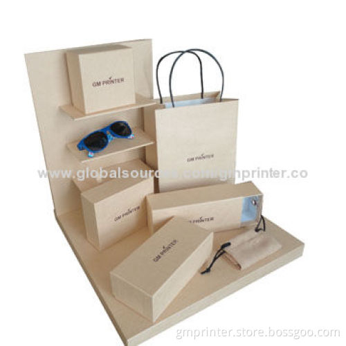 Cardboard gift boxes with eyeglass cases and fashion accessory